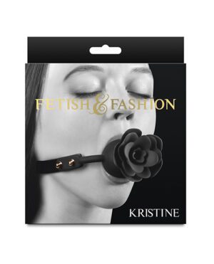 A product packaging design featuring a woman's lower face with a rose-shaped gag in her mouth, overlaid with the text "FETISH & FASHION" in gold lettering and the name "KRISTINE" at the bottom. The background is black, resembling a hanging tag design.