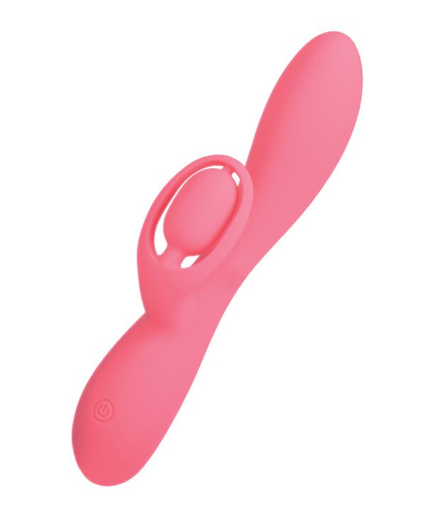 A pink silicone spatula isolated on a white background.