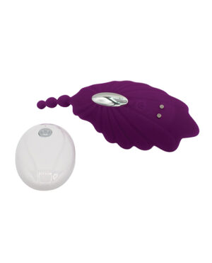 A purple silicone leaf-shaped device with embedded LED lights beside its slim, white oval-shaped remote control, both isolated on a white background.