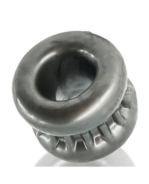 A rubber dog chew toy in the shape of a ring with raised ridges, on a white background.