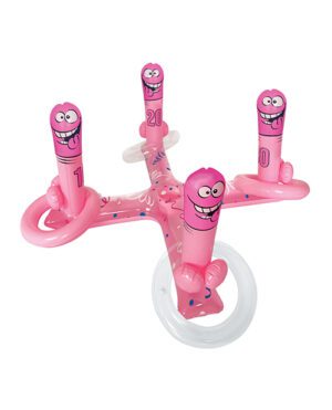 A pink inflatable ring toss game with happy cartoon faces and numbered upright posts.