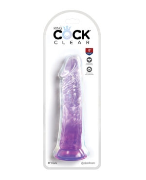 A transparent purple dildo featuring a realistic design, packaged for retail display.