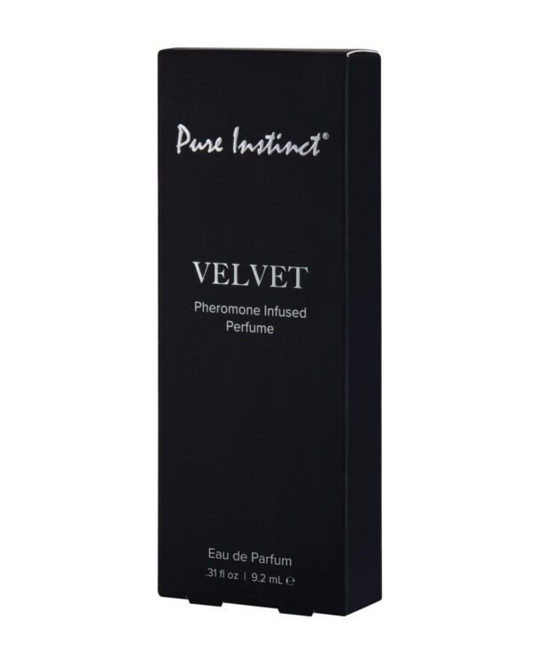 Black perfume box with Pure Instinct Velvet branding and text indicating it is a pheromone-infused perfume.