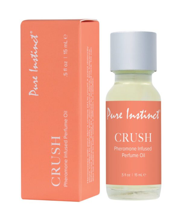 An image showing a bottle of Pure Instinct Crush pheromone-infused perfume oil next to its orange packaging box.