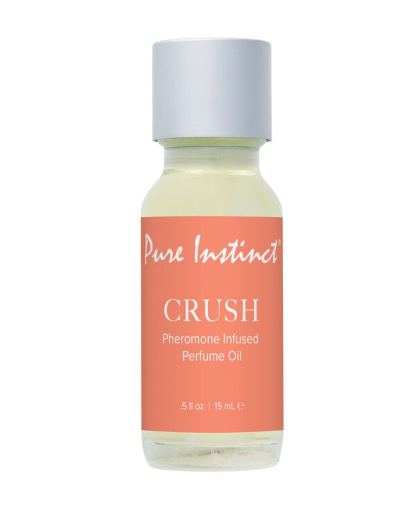 A small bottle of Pure Instinct Crush Pheromone Infused Perfume Oil against a white background.