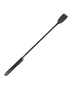 A black riding crop with a looped handle and a gold-colored accent where the handle meets the shaft.