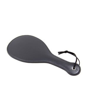 Black leather paddle with a loop handle on a white background.