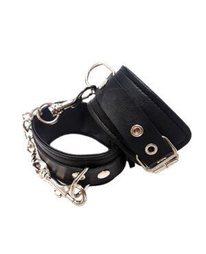 A black leather wrist cuff with metallic chain and buckle attachments on a white background.