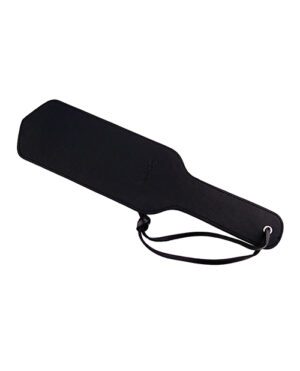 A black leather paddle with a wrist strap against a white background.