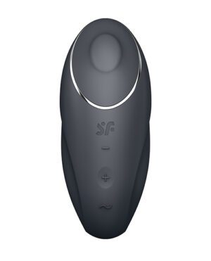 A black handheld remote control with a circular button at the top and plus, minus, and power symbols below it on a white background.