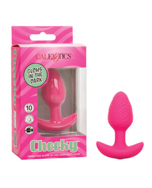 A pink vibrating glow-in-the-dark butt plug by CalExotics, named "Cheeky," displayed with its packaging which highlights 10 different functions.