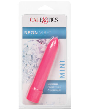 A neon pink mini vibrator by Calexotics, named "NEON VIBE," packaged in a clear plastic casing with a white, blue, and pink labeled card behind it, featuring descriptors like "multi-speed," "power-packed," and "waterproof."