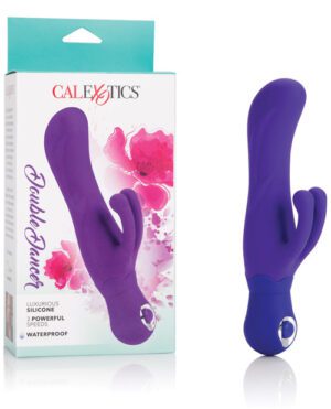 A purple silicone personal massager next to its packaging box with the CalExotics brand, featuring flower illustrations and product details.