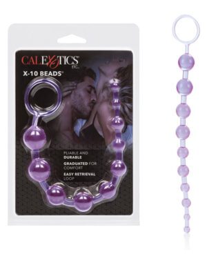 Product packaging for "CALEXOTICS X-10 Beads" featuring a string of purple graduated anal beads with a retrieval loop, set against a background with an image of a couple embracing. The packaging highlights that the beads are pliable, durable, and designed for comfort.