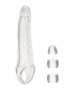 A transparent glass sculpture with a rippled texture accompanied by three round, glass accessories, isolated on a white background.