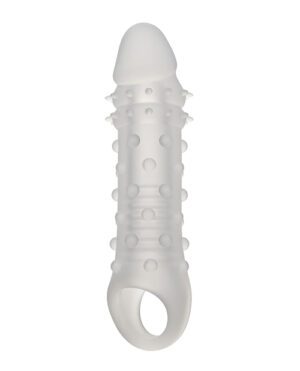 A white silicone sleeve with raised bumps and textures on a white background