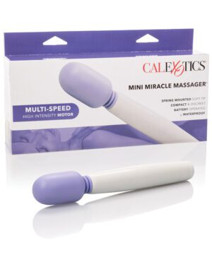 A mini miracle massager by CalExotics with multi-speed and high-intensity motor features, showcased alongside its packaging which highlights that it is spring mounted, soft tip, compact, discreet, battery operated, and waterproof.