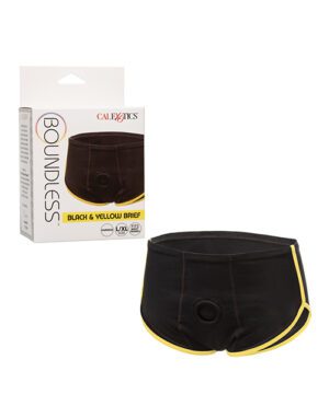A pair of black and yellow briefs with packaging box from CalExotics, labeled as "BOUNDLESS Black & Yellow Brief."