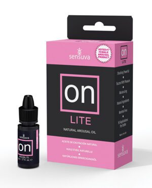 A bottle of Sensuva ON Lite natural arousal oil next to its pink and black product packaging box with text and branding.