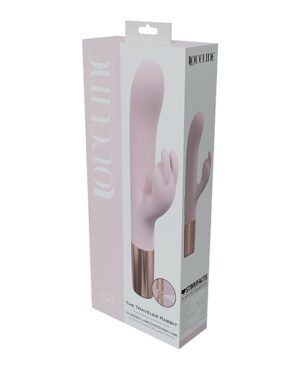 Product packaging for a "Loveline The Traveler Rabbit" personal massager with a pale pink color scheme and a window showing the product inside.