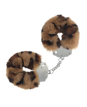 Two sets of novelty handcuffs with faux fur covering isolated on white background.