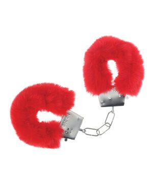 A pair of red furry handcuffs with a metal chain and locking mechanism against a white background.