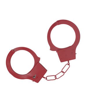 A pair of red handcuffs isolated on a white background.