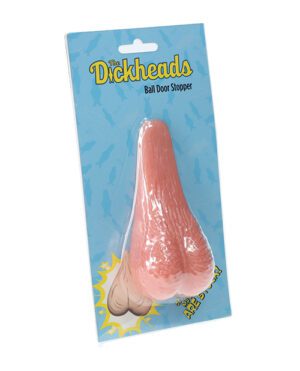 A novelty door stopper product packaged on a blue card with the brand "The Dickheads" written at the top. The item is designed to resemble a human anatomical part and is labeled as "Ball Door Stopper."