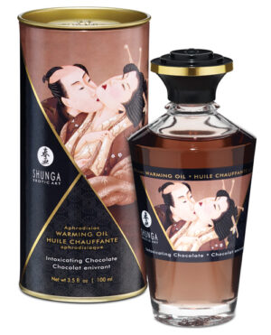 A bottle of warming chocolate massage oil with a decorative canister featuring a couple in a romantic embrace, designed as an aphrodisiac.