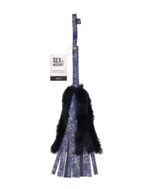 A plush-handled flogger with fur-like detail and blue-black tails, displayed against a white background.