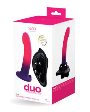 A box of VeDO Duo product showcasing a semi-realistic dildo with an included adjustable harness.