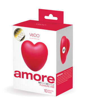 A product box for a "VeDo amore Rechargeable Pleasure Vibe" with a heart-shaped design showcased on the front, the label indicating "10 Vibration Modes," and a sticker stating "Over 5 Million VeDo Toys Sold."