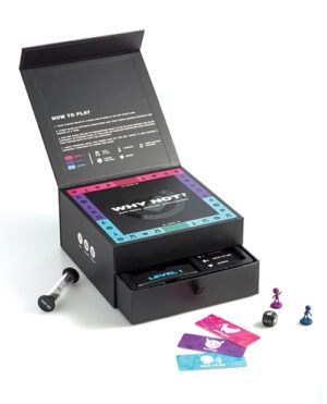 Open black board game box displaying the game's title "WHY NOT?" with playing instructions inside the lid, various game cards, dice, and player pieces scattered around the box.