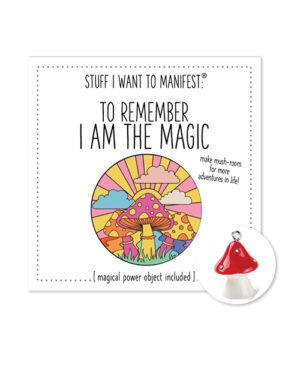 A motivational decor card reading "To Remember I am the Magic" with a colorful mushroom design and a small red mushroom-shaped charm attached.