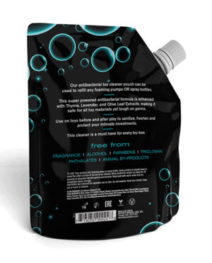 A black flexible pouch with a white cap on top, intended for refill purposes, is labeled as an antibacterial toy cleaner. The product is advertised as free from fragrance, alcohol, parabens, triclosan, phthalates, and animal by-products, with additional information about its ingredients and usage. The package has a glossy finish with blue bubble designs.