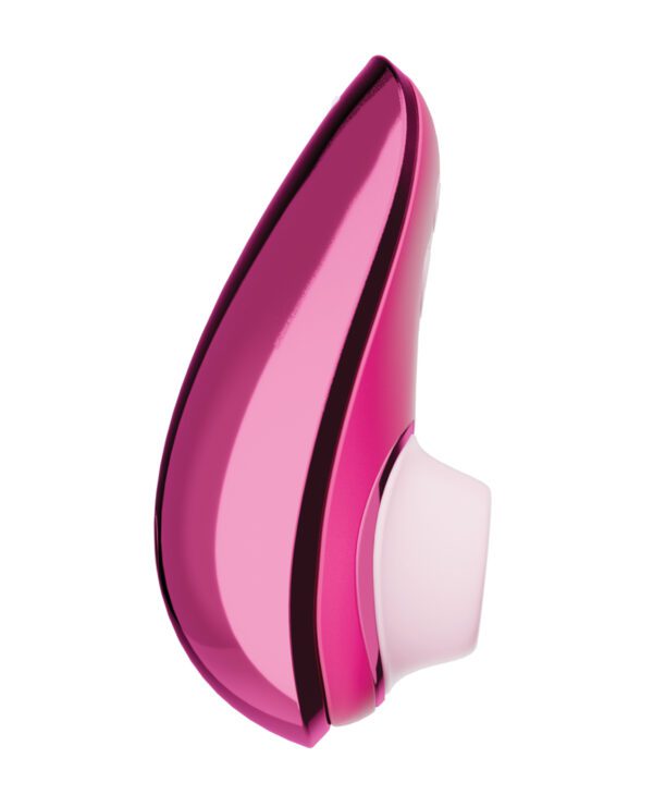 Side view of a sleek pink wireless Bluetooth earpiece against a white background