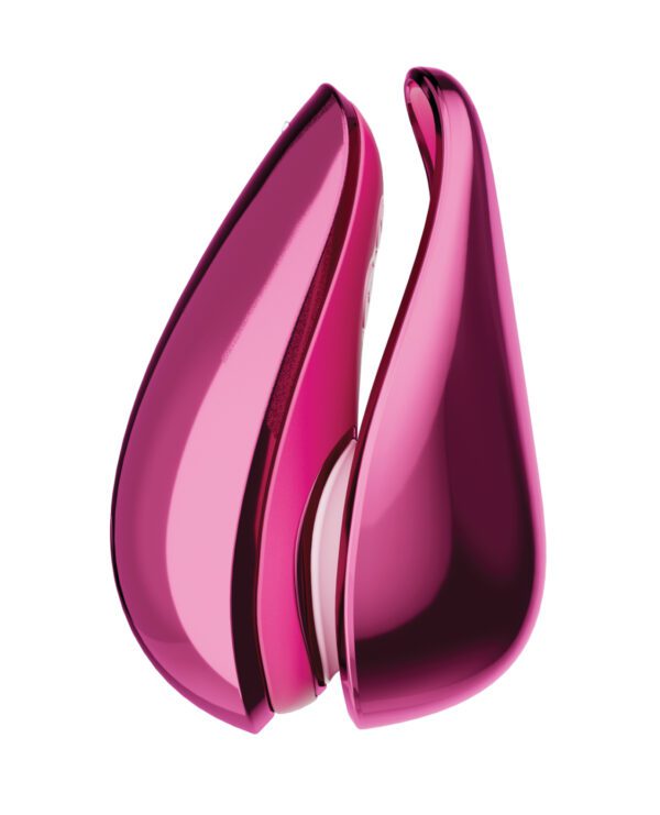 Close-up of an open, shiny pink lipstick case on a white background.