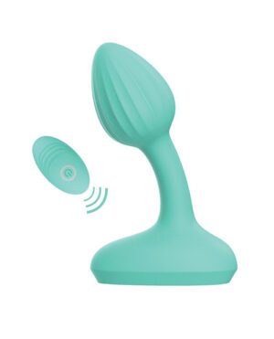 A teal-colored silicone object with a remote control indicating wireless functionality, set against a white background.