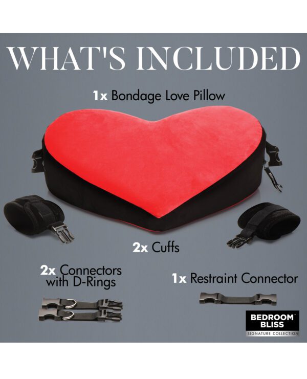 A red heart-shaped pillow, two cuffs, and metal connectors on a grey background, labeled as parts of a bondage set.