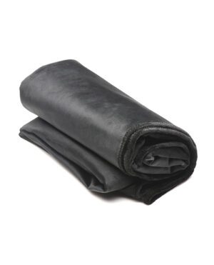 A rolled up piece of black fabric on a white background