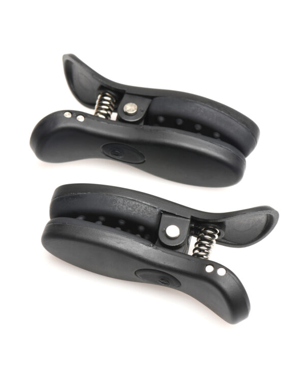 Two black hair clips with a spring mechanism, positioned one above the other.