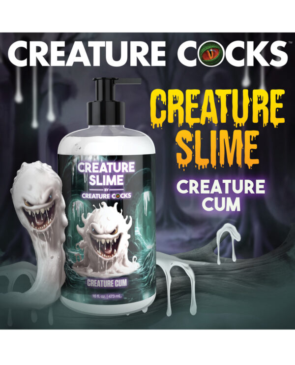 A bottle of Creature Slime by Creature Cocks featuring a cartoonish monster and a spooky background, highlighting its unique design and branding.